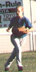 Becky playing softball
